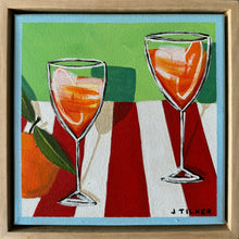 Load image into Gallery viewer, Two Aperol spritz on red and white
